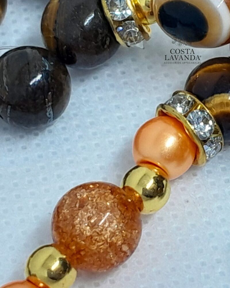 Juego de matinée y aretes naranja, dorado y mano de Fátima